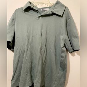 A beautiful green polo from Zara that is a small